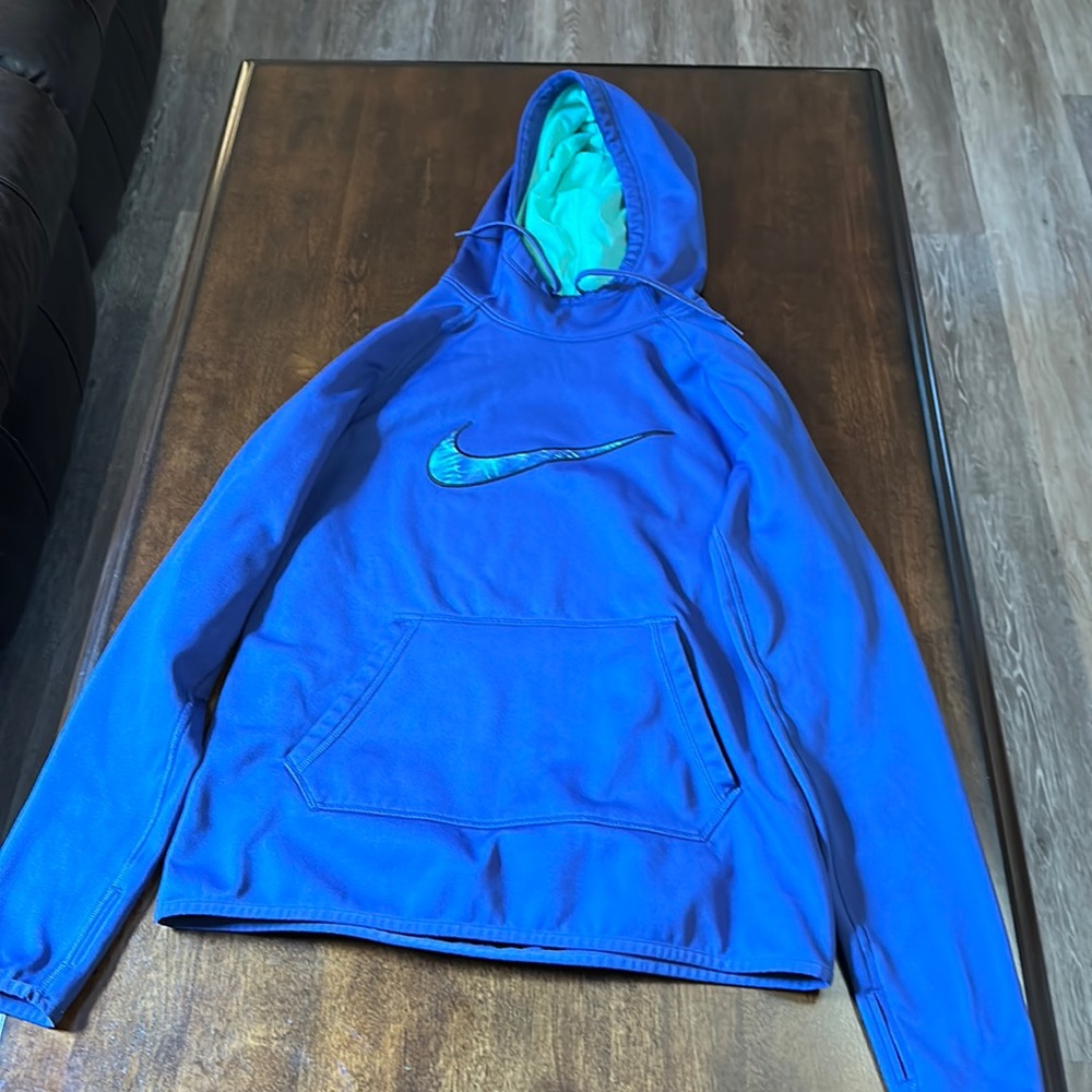 Nike hoodie size small.